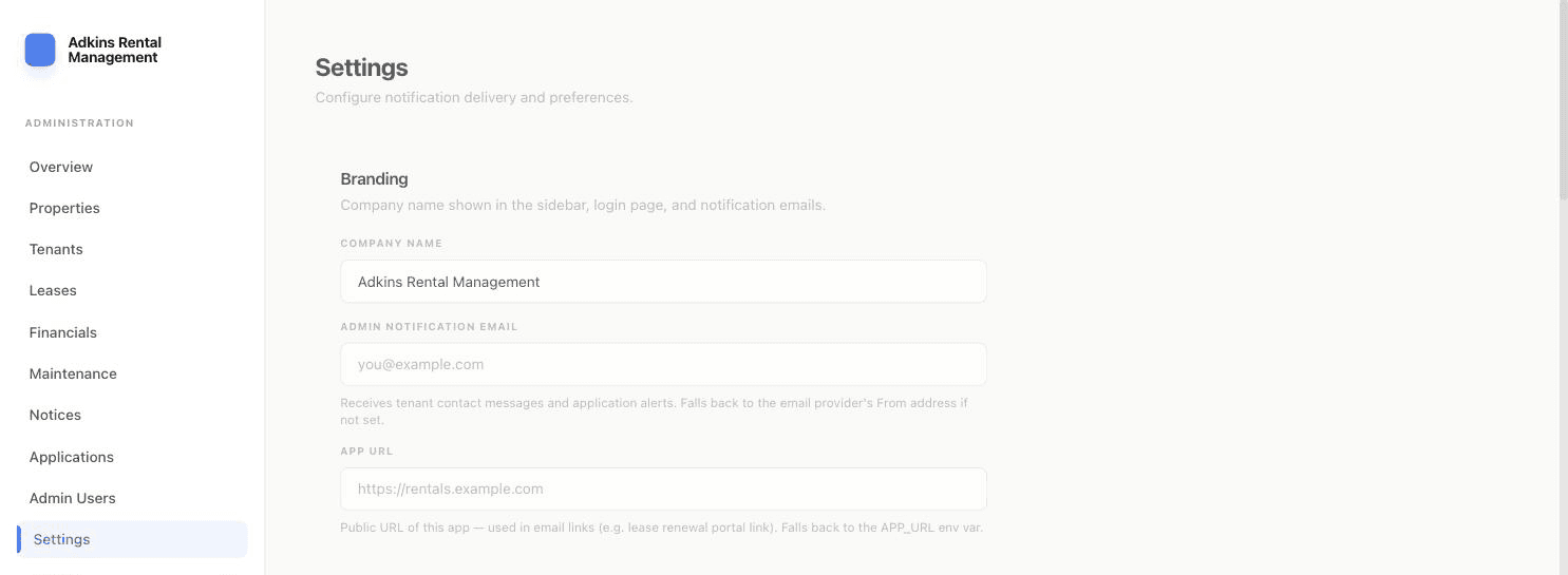 Settings page Branding section with company name, admin notification email, and app URL fields